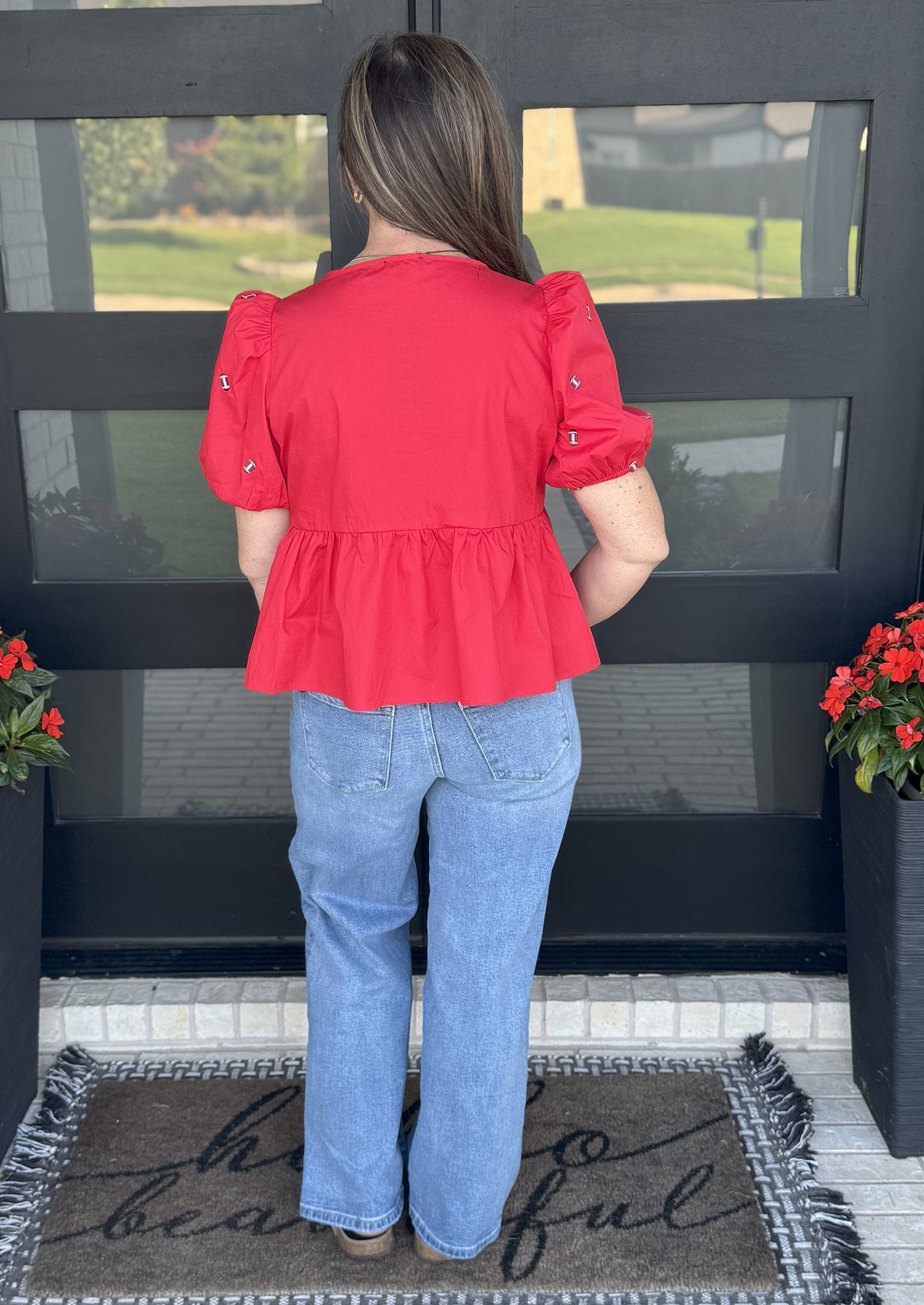 The Touchdown Peplum Top