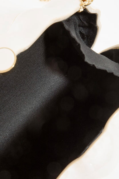 The Riviera Shell Clutch